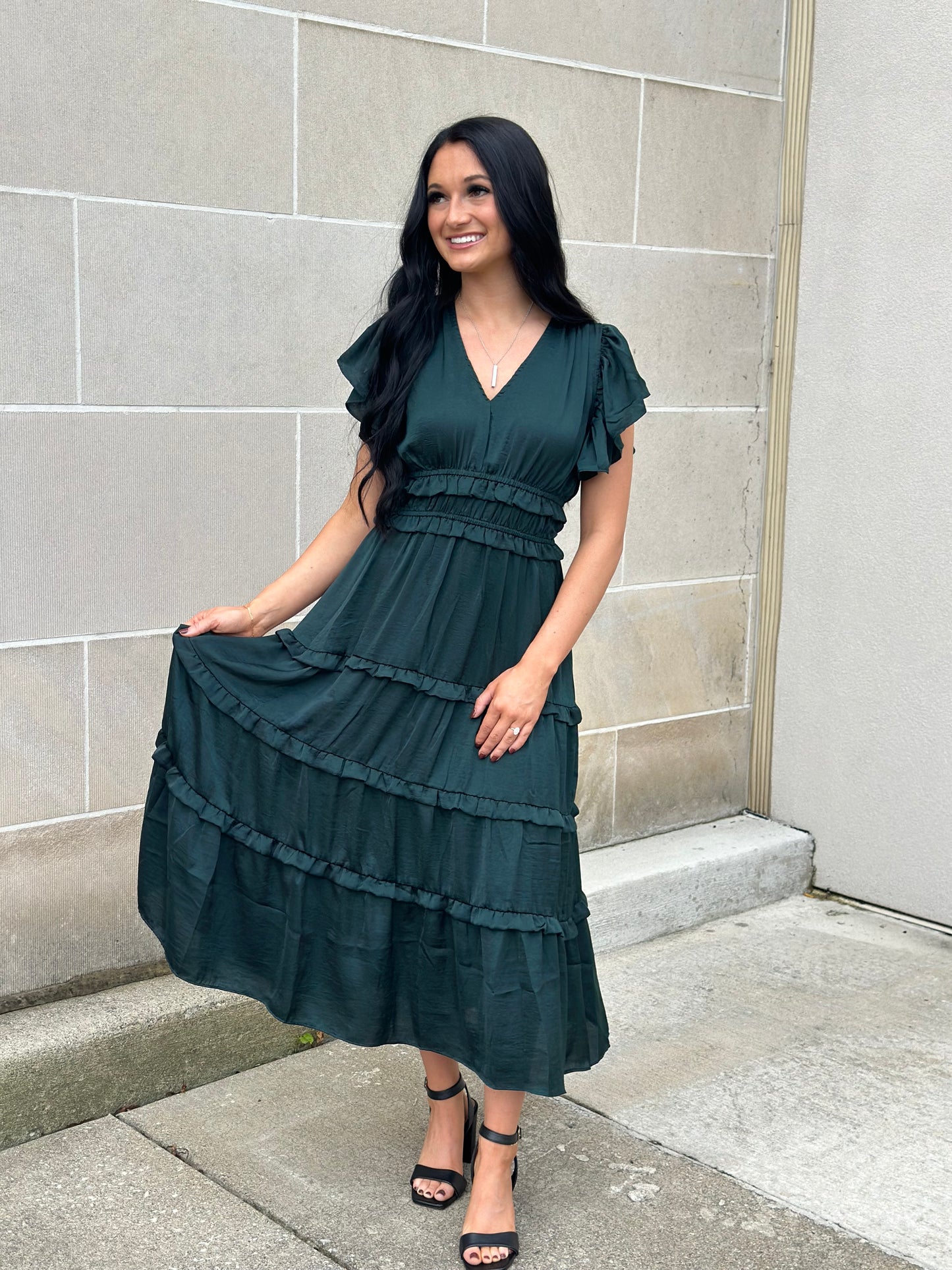 emerald ruffle hem dress