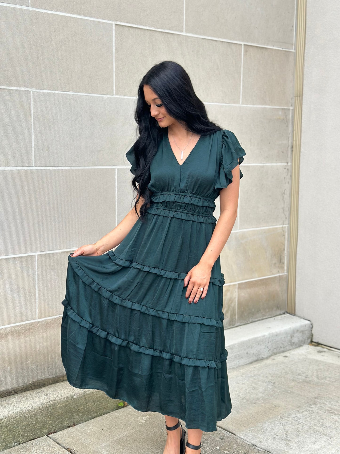 emerald ruffle hem dress