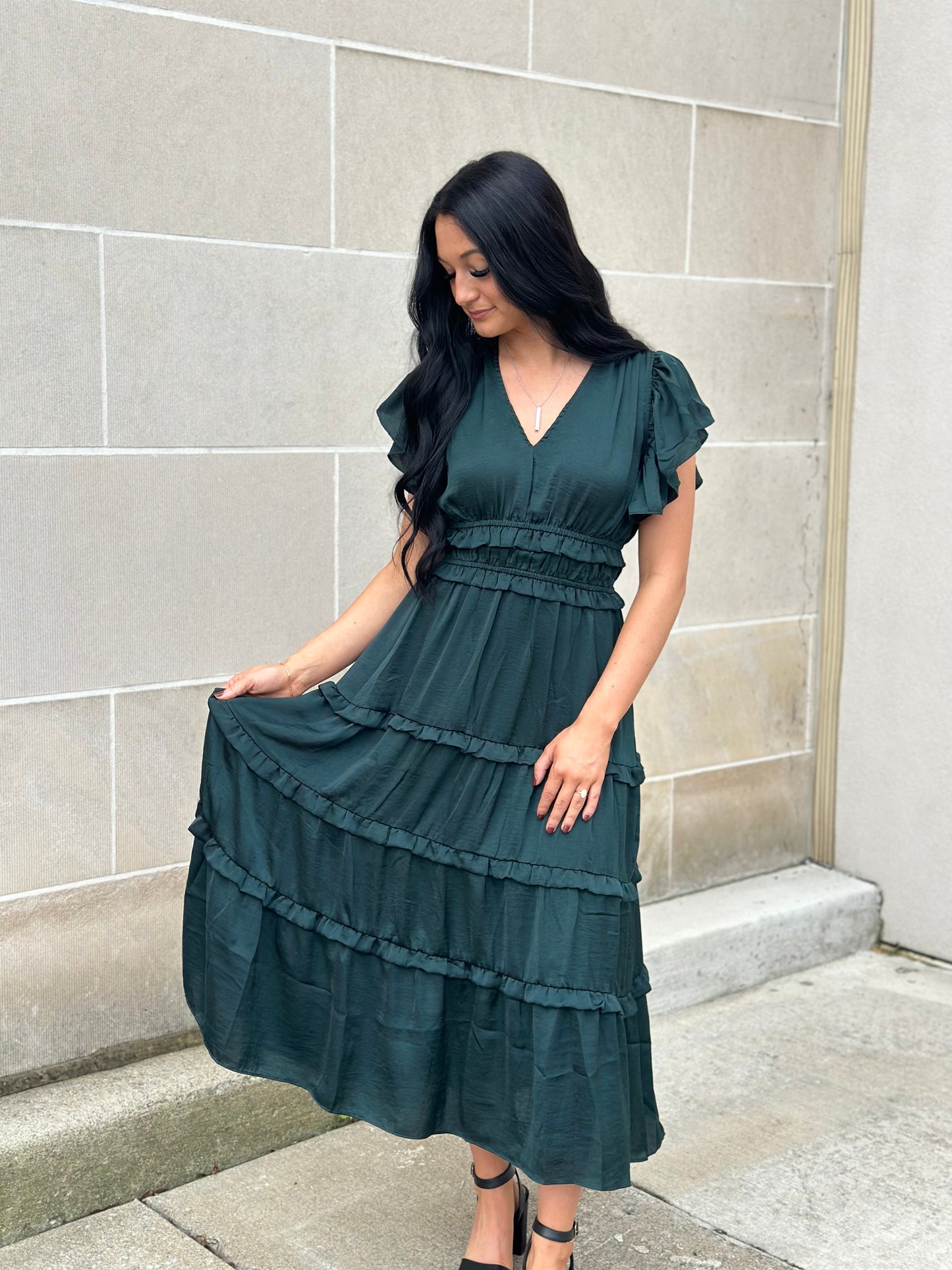 emerald ruffle hem dress